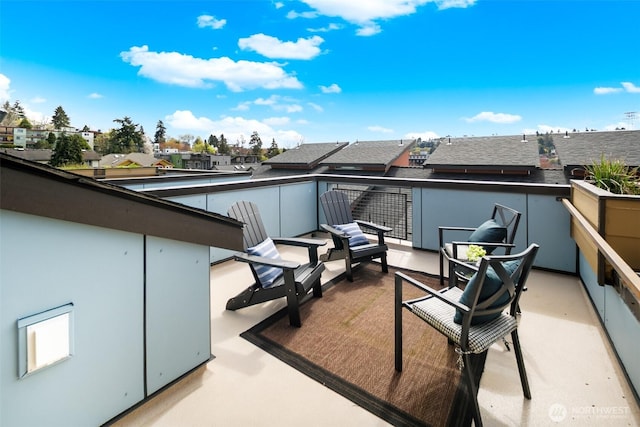 view of patio / terrace featuring a residential view and a balcony