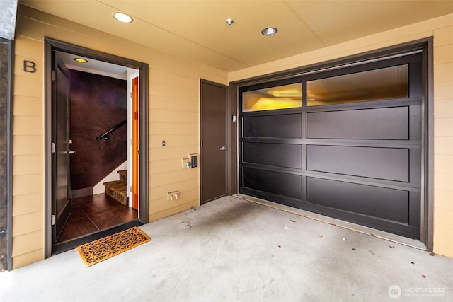 property entrance with a garage