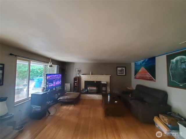 4709 SE 26th Ave, Lacey, WA 98503 - living area featuring wood finished floors and a fireplace