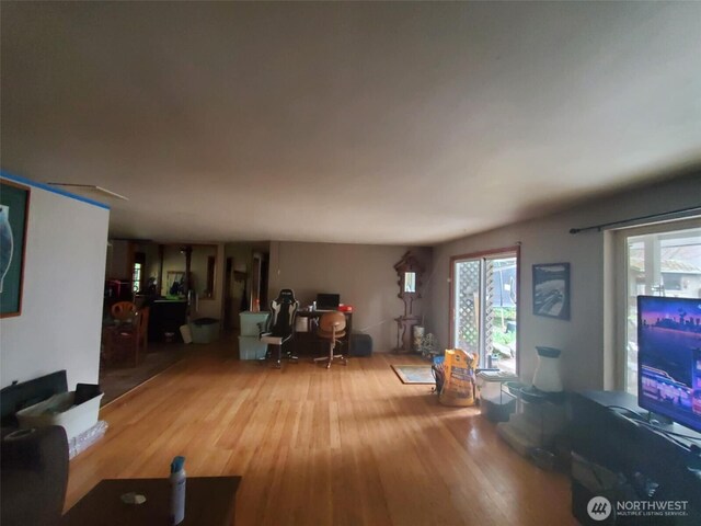 4709 SE 26th Ave, Lacey, WA 98503 - living room featuring wood finished floors and a desk