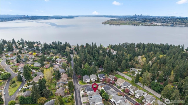 aerial view with a residential view and a water view