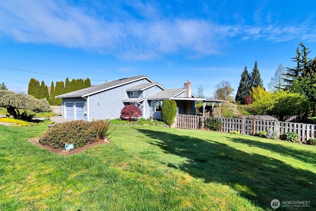 3521 Upland Ave, Everett, WA 98203 - view of front facade with a chimney and an attached garage