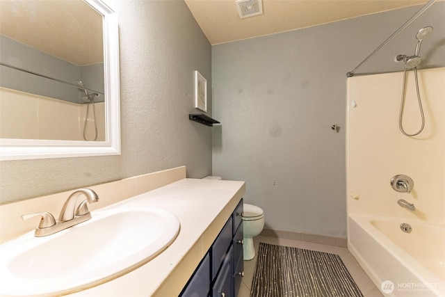 full bath featuring vanity, toilet, tile patterned floors, shower / bathing tub combination, and visible vents