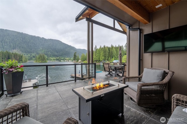view of patio / terrace featuring a fire pit