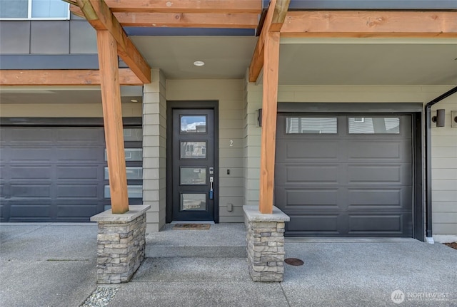 19225 Damson Rd Unit J2, Lynnwood, WA 98036 - doorway to property with a garage