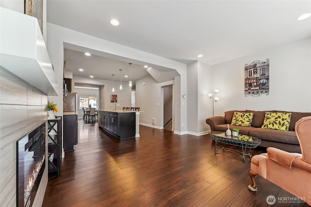 19225 Damson Rd Unit J2, Lynnwood, WA 98036 - living room with dark wood-type flooring, baseboards, and recessed lighting