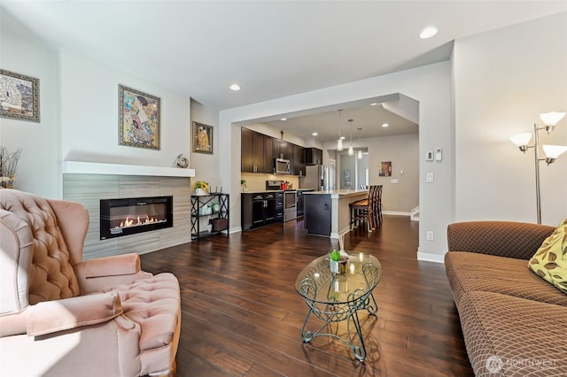 19225 Damson Rd Unit J2, Lynnwood, WA 98036 - living area with recessed lighting, dark wood-type flooring, a tile fireplace, and baseboards
