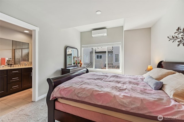 19225 Damson Rd Unit J2, Lynnwood, WA 98036 - bedroom featuring baseboards, light colored carpet, a wall unit AC, and connected bathroom