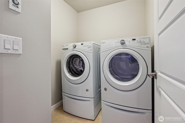 19225 Damson Rd Unit J2, Lynnwood, WA 98036 - clothes washing area with washing machine and clothes dryer and laundry area