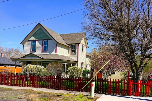 1321 Chestnut St, Milton-Freewater, OR 97862 - victorian-style house with a fenced front yard and a shingled roof
