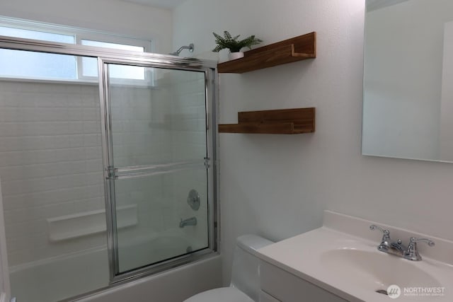 24762 45th Ave S Unit 12-D1, Kent, WA 98032 - bathroom with toilet, enclosed tub / shower combo, and vanity