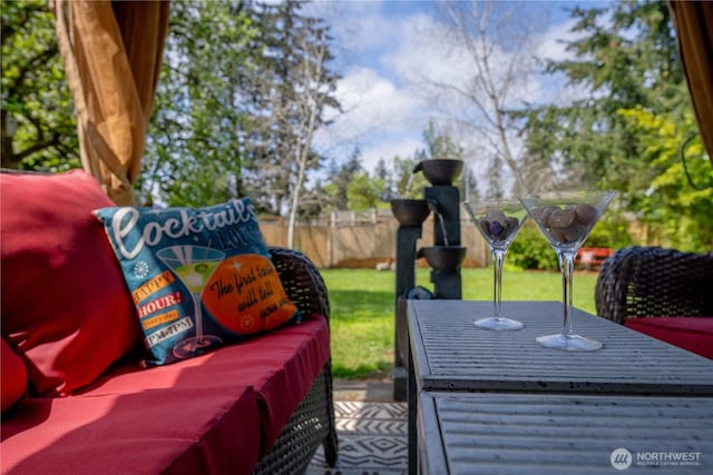 deck with fence, a yard, and an outdoor hangout area