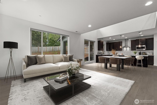 7872 198th Avenue Pl E, Bonney Lake, WA 98391 - living room with light wood-type flooring, recessed lighting, and baseboards