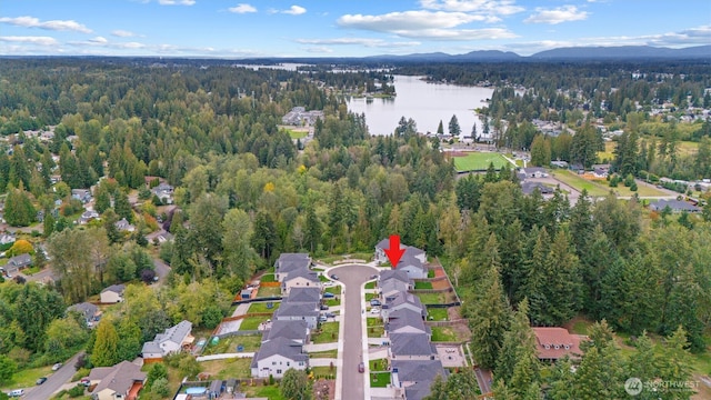 7872 198th Avenue Pl E, Bonney Lake, WA 98391 - aerial view of property's location featuring a water and mountain view, a forest, and nearby suburban area
