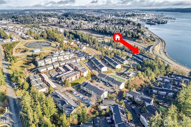 bird's eye view with a water view