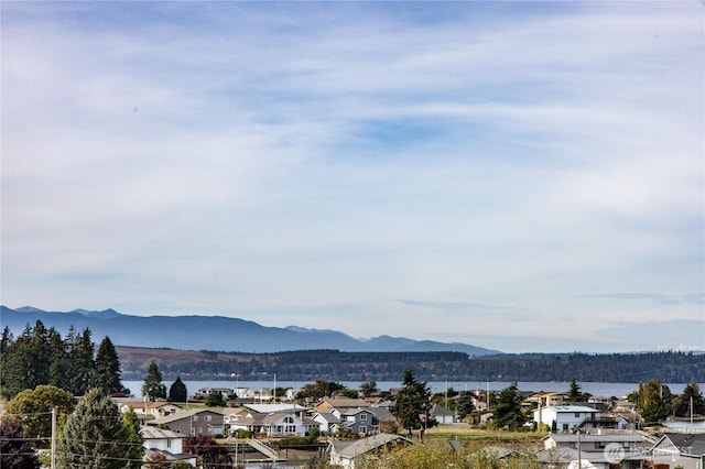 5195 NE Cedar Ln, Hansville, WA 98340 - property view of mountains featuring a residential view and a water view