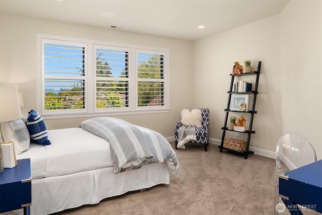 carpeted bedroom with recessed lighting and baseboards