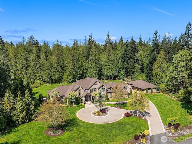 bird's eye view featuring a view of trees