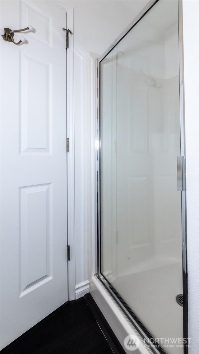 full bath featuring a stall shower