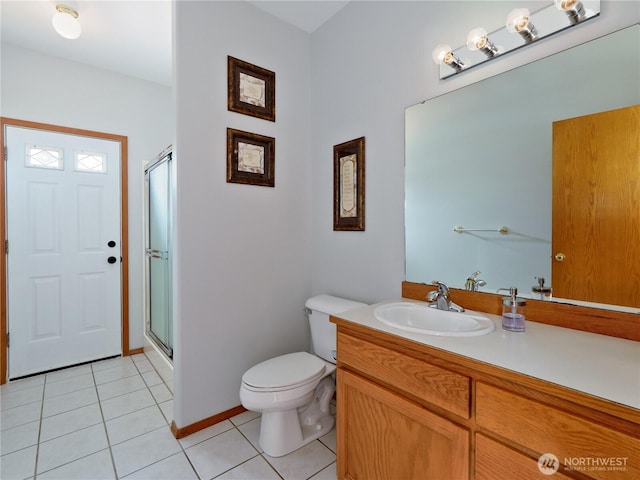 full bathroom with toilet, a stall shower, vanity, and tile patterned flooring