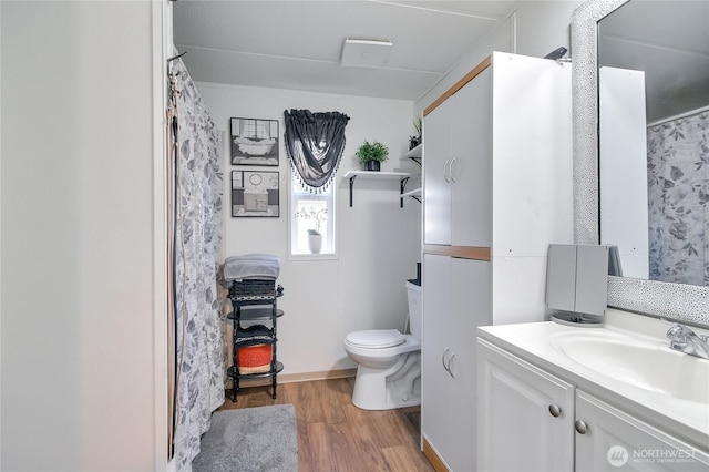 31600 126th Ave SE Unit 114, Auburn, WA 98092 - full bath with toilet, a shower with curtain, vanity, and wood finished floors