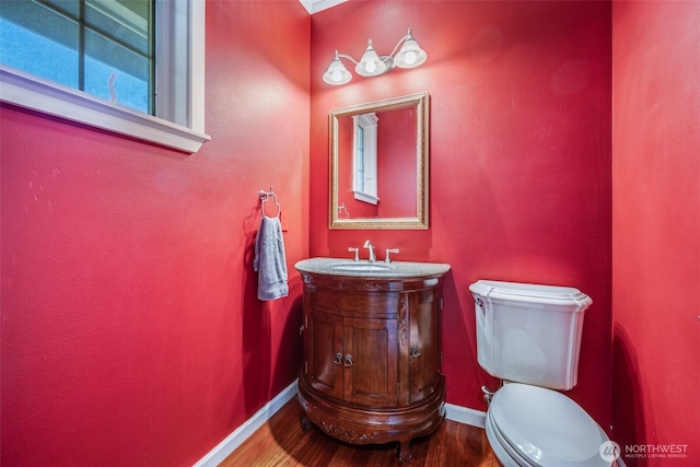 36984 Aspen Way NE, Hansville, WA 98340 - bathroom with wood finished floors, vanity, toilet, and baseboards