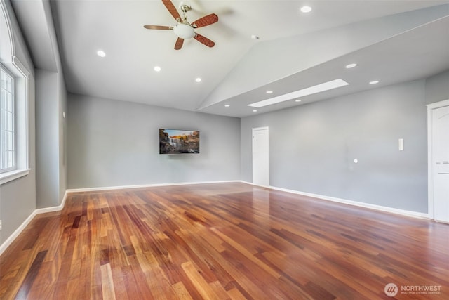 36984 Aspen Way NE, Hansville, WA 98340 - unfurnished room featuring lofted ceiling, ceiling fan, wood finished floors, baseboards, and recessed lighting
