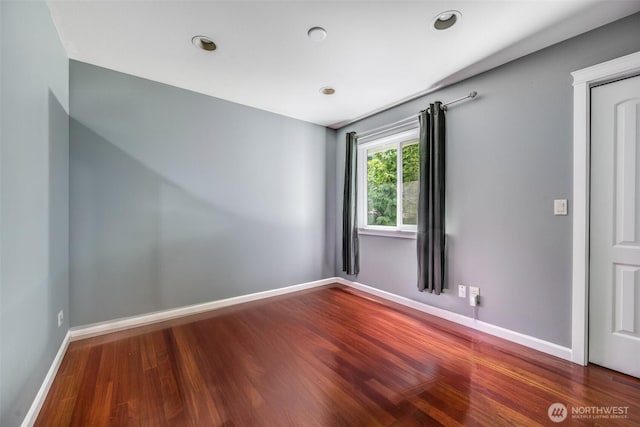 36984 Aspen Way NE, Hansville, WA 98340 - unfurnished room featuring wood finished floors, baseboards, and recessed lighting