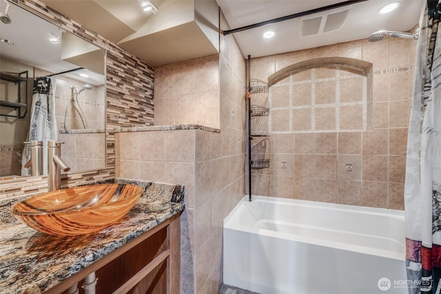 36984 Aspen Way NE, Hansville, WA 98340 - bathroom featuring tile walls, shower / bathtub combination with curtain, and vanity