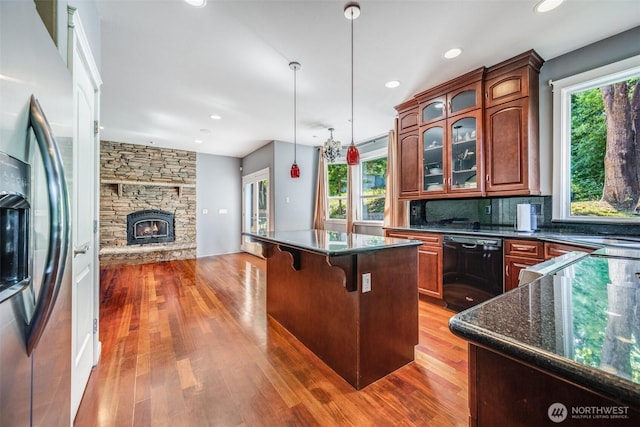 36984 Aspen Way NE, Hansville, WA 98340 - kitchen featuring stainless steel fridge, black dishwasher, healthy amount of natural light, a kitchen island, and recessed lighting