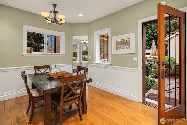 180 Lake Washington Blvd E, Seattle, WA 98112 - dining area featuring a decorative wall, light wood-style flooring, recessed lighting, a chandelier, and a wainscoted wall