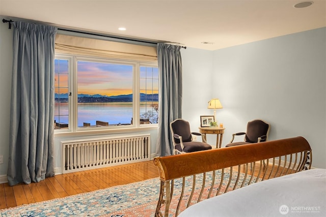 180 Lake Washington Blvd E, Seattle, WA 98112 - bedroom with wood-type flooring, baseboards, recessed lighting, and radiator