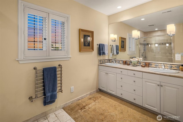 180 Lake Washington Blvd E, Seattle, WA 98112 - full bathroom featuring a sink, visible vents, a shower stall, and double vanity