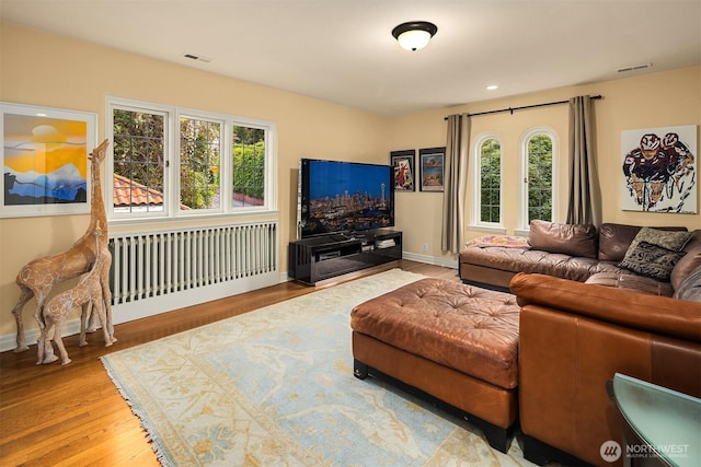 180 Lake Washington Blvd E, Seattle, WA 98112 - living room with visible vents, baseboards, and wood finished floors