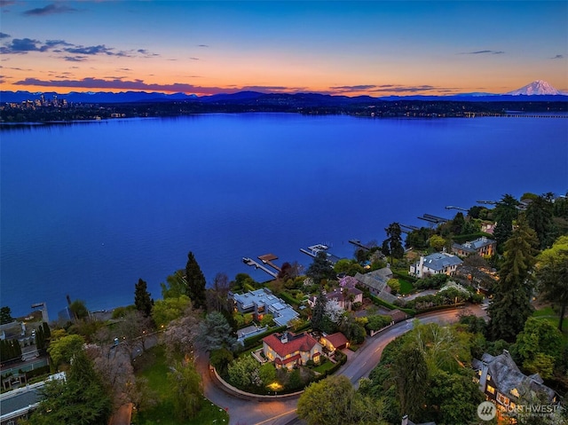 180 Lake Washington Blvd E, Seattle, WA 98112 - aerial view at dusk featuring a water and mountain view