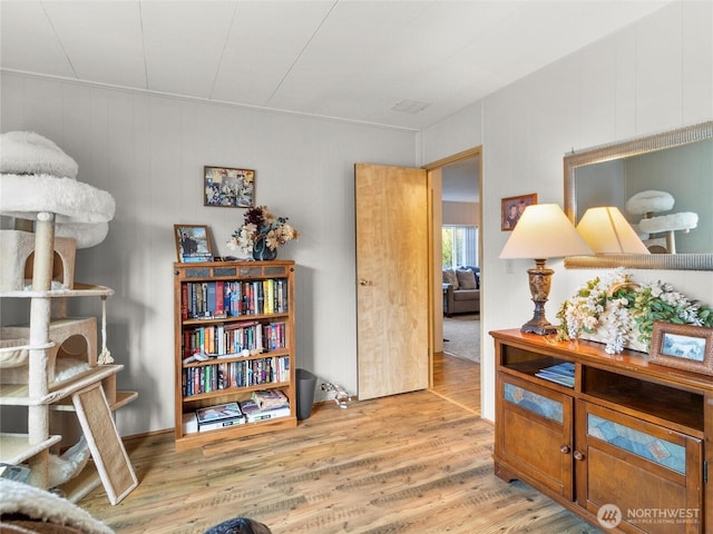 living area with wood finished floors