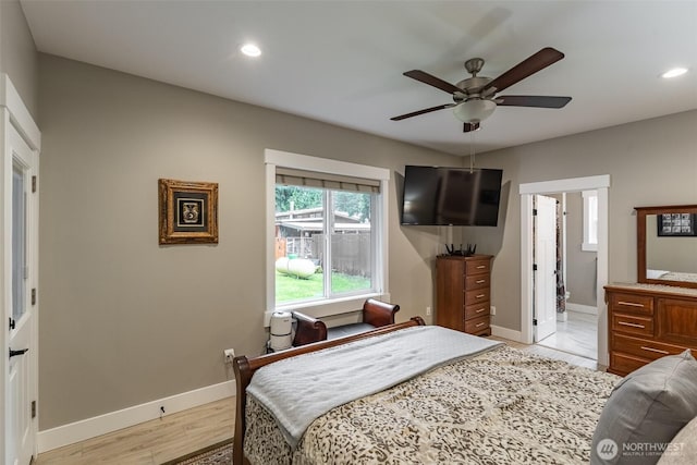 6321 Pony Pl, Maple Falls, WA 98266 - bedroom with baseboards, a ceiling fan, light wood-style floors, recessed lighting, and connected bathroom