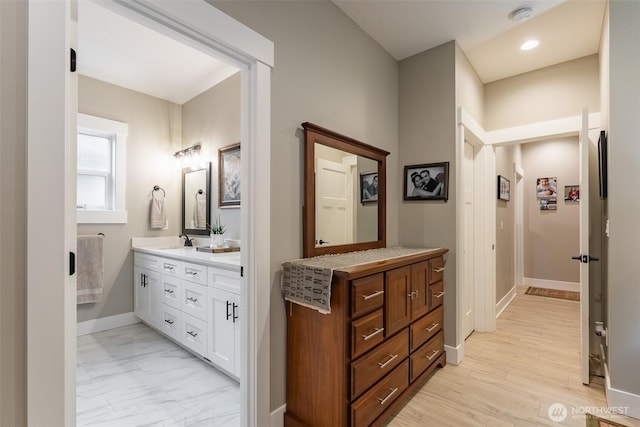 6321 Pony Pl, Maple Falls, WA 98266 - full bath with marble finish floor, vanity, baseboards, and recessed lighting