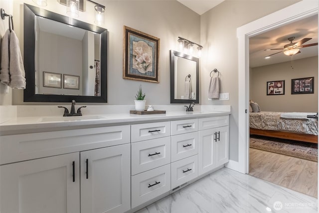 6321 Pony Pl, Maple Falls, WA 98266 - ensuite bathroom with ceiling fan, ensuite bath, marble finish floor, a sink, and double vanity