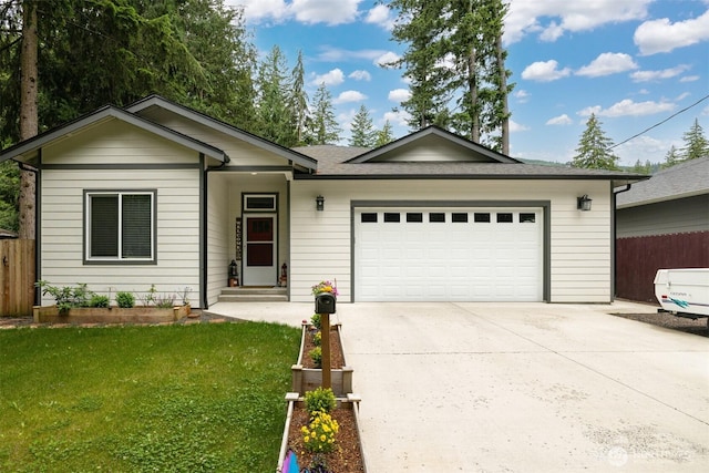 6321 Pony Pl, Maple Falls, WA 98266 - single story home featuring a garage, a front yard, fence, and concrete driveway