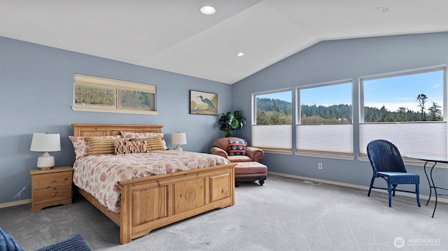 4504 Queen Ann Way, Anacortes, WA 98221 - bedroom featuring vaulted ceiling, light colored carpet, baseboards, and recessed lighting