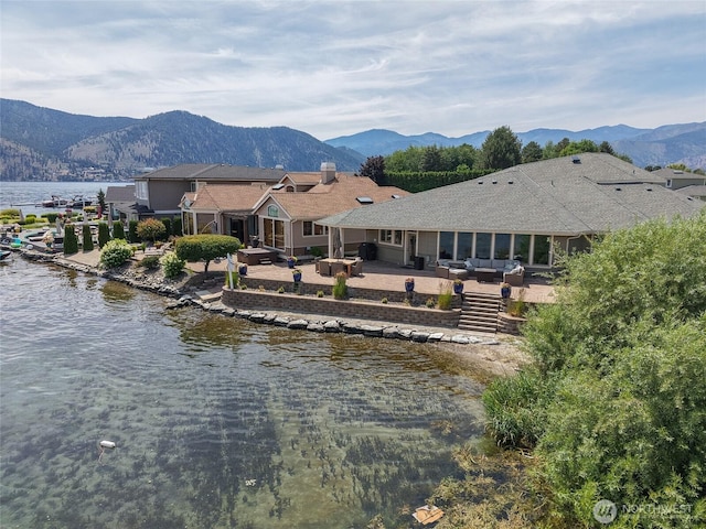 215 Wall St, Manson, WA 98831 - mountain view with a nearby body of water