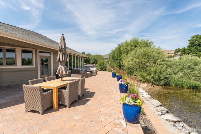 215 Wall St, Manson, WA 98831 - view of patio / terrace featuring an outdoor hangout area and outdoor dining space
