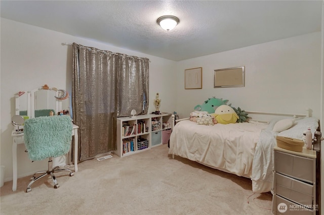 9410 175th Street Ct E, Puyallup, WA 98375 - bedroom with visible vents, carpet flooring, and a textured ceiling