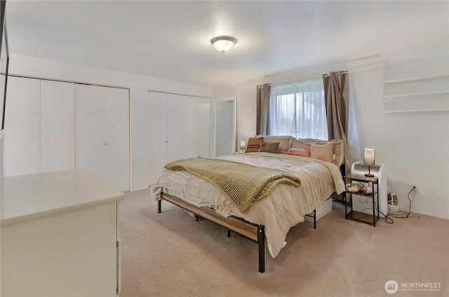 9410 175th Street Ct E, Puyallup, WA 98375 - bedroom with light colored carpet and two closets