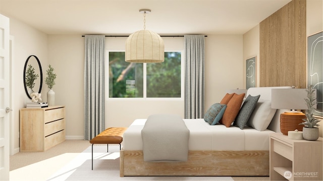 carpeted bedroom featuring baseboards