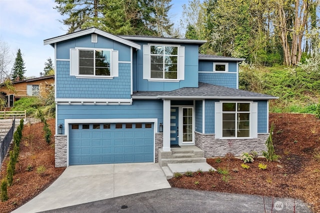 18122 83rd Ave NE, Kenmore, WA 98028 - view of front of property with an attached garage, concrete driveway, fence, and stone siding