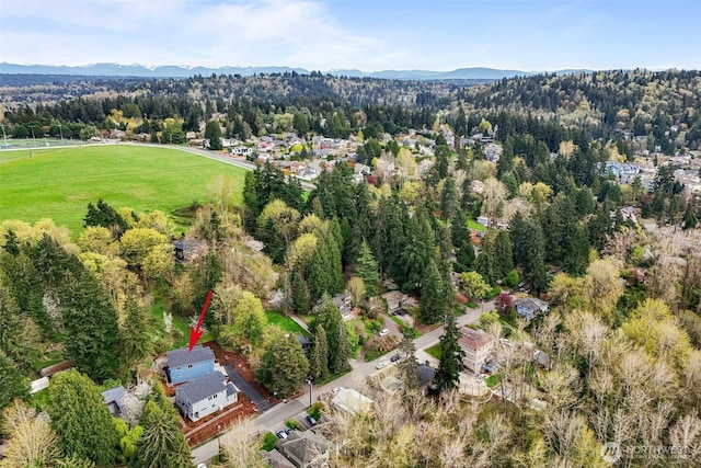 18122 83rd Ave NE, Kenmore, WA 98028 - drone / aerial view featuring a view of trees and a mountain view
