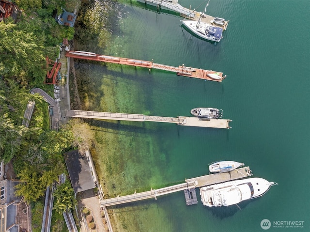 drone / aerial view with a water view