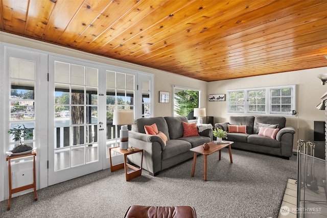 carpeted living room with french doors and wooden ceiling